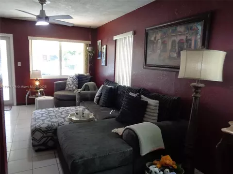 Living - 385 E 56th St, Hialeah, FL 33013 photo 1 of 8