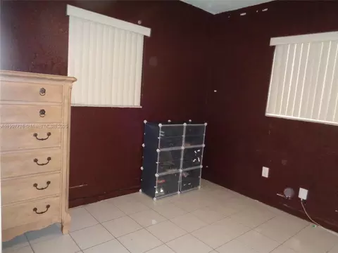 Bedroom - 385 E 56th St, Hialeah, FL 33013 photo 8 of 11