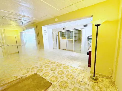 Living - 880 E 28th St, Hialeah, FL 33013 photo 2 of 2