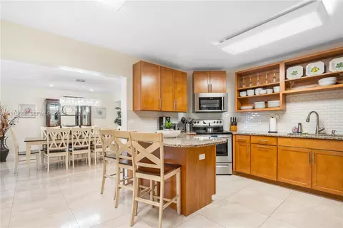 Kitchen - 281 SE 3rd Ct, Pompano Beach, FL 33060 photo 2 of 3