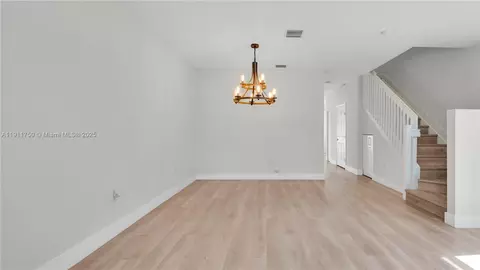 Living - 10547 W 34th Ct, Hialeah, FL 33018 photo 3 of 7