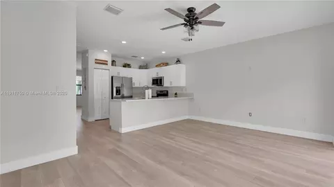 Living - 10547 W 34th Ct, Hialeah, FL 33018 photo 7 of 7