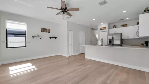 Living - 10547 W 34th Ct, Hialeah, FL 33018 photo 6 of 7
