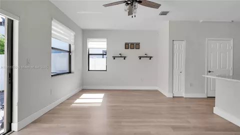 Living - 10547 W 34th Ct, Hialeah, FL 33018 photo 5 of 7