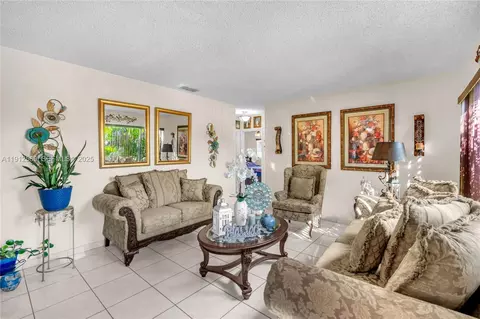 Living - 683 W 39th St, Hialeah, FL 33012 photo 1 of 2