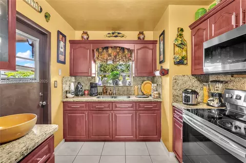 Kitchen - 683 W 39th St, Hialeah, FL 33012 photo 3 of 4