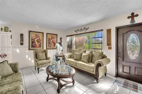 Living - 683 W 39th St, Hialeah, FL 33012 photo 2 of 2