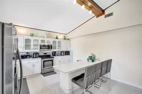 Kitchen - 311 E 51st St, Hialeah, FL 33013 photo 3 of 4