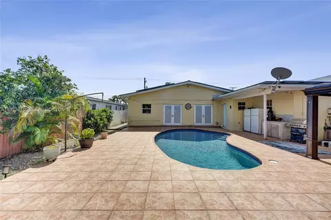 Exterior - 311 E 51st St, Hialeah, FL 33013 photo 4 of 6