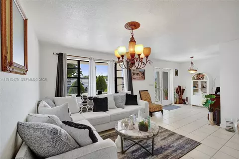 Living - 311 E 51st St, Hialeah, FL 33013 photo 3 of 4