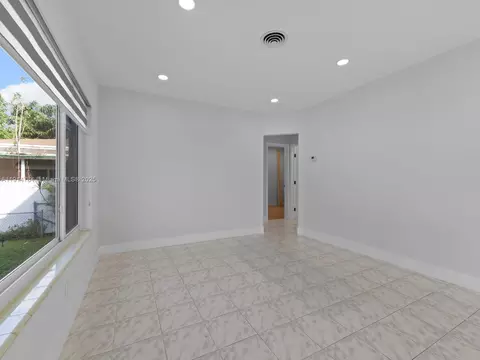 Living - 104 E 58th St, Hialeah, FL 33013 photo 1 of 5