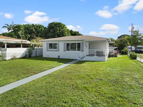 Exterior - 104 E 58th St, Hialeah, FL 33013 photo 2 of 7