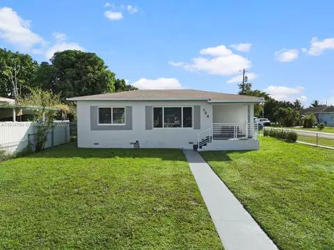 Exterior - 104 E 58th St, Hialeah, FL 33013 photo 3 of 7