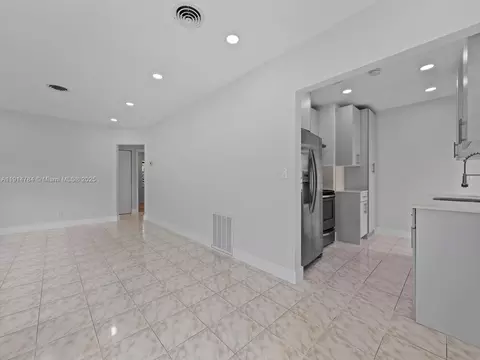 Living - 104 E 58th St, Hialeah, FL 33013 photo 5 of 5