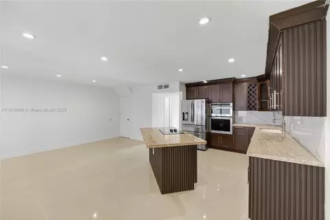 Kitchen - 6822 W 2nd Ln, Hialeah, FL 33014 photo 3 of 4
