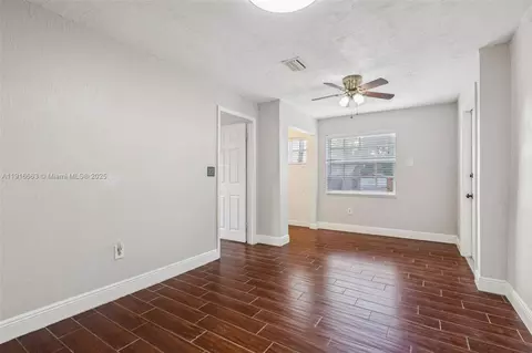 Living - 6230 E 2nd Ave, Hialeah, FL 33013 photo 4 of 8