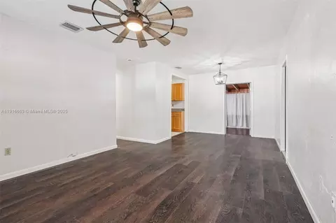 Living - 6230 E 2nd Ave, Hialeah, FL 33013 photo 2 of 8
