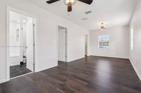 Living - 6230 E 2nd Ave, Hialeah, FL 33013 photo 7 of 8