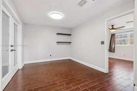 Living - 6230 E 2nd Ave, Hialeah, FL 33013 photo 6 of 8