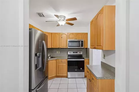 Kitchen - 6230 E 2nd Ave, Hialeah, FL 33013 photo 1 of 3