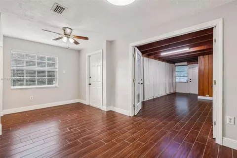 Living - 6230 E 2nd Ave, Hialeah, FL 33013 photo 5 of 8