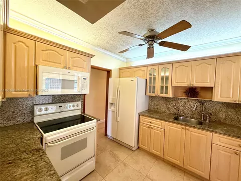 Kitchen - 174 E 41st St, Hialeah, FL 33013 photo 3 of 4