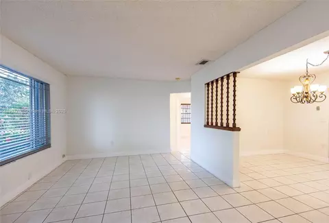 Living - 990 E 2nd St, Hialeah, FL 33010 photo 4 of 6