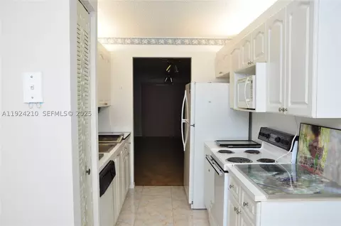13000 SW 15th Ct #411U, Pembroke Pines, FL 33027