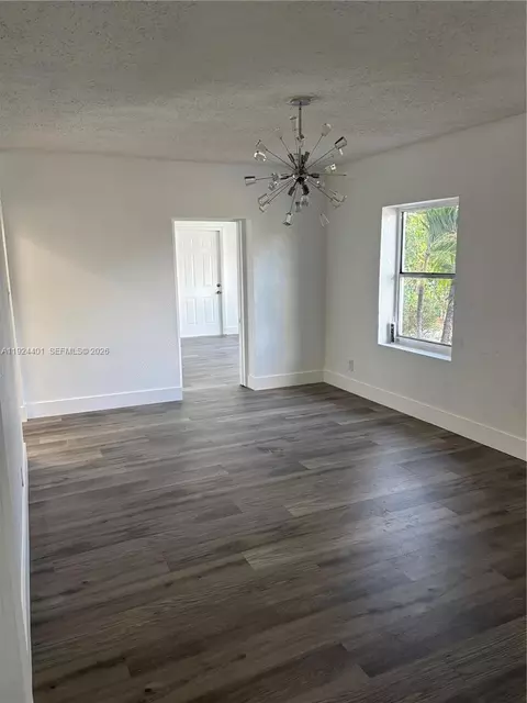 Living - 354 E 50th St, Hialeah, FL 33013 photo 2 of 3