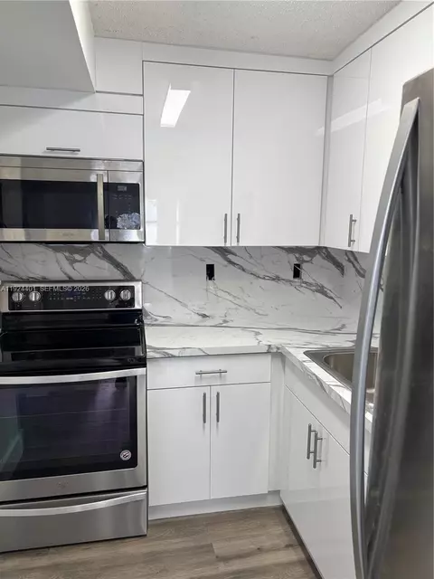 Kitchen - 354 E 50th St, Hialeah, FL 33013 photo 1 of 2