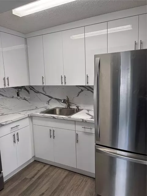 Kitchen - 354 E 50th St, Hialeah, FL 33013 photo 2 of 2