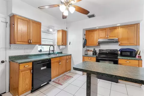 Kitchen - 355 W 54th St, Hialeah, FL 33012 photo 3 of 4