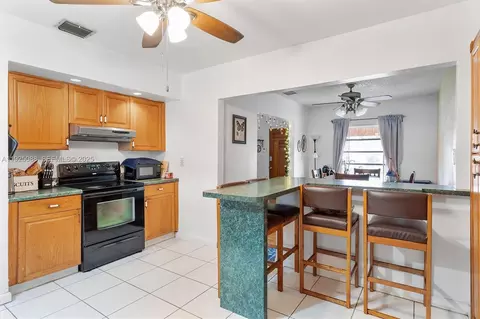 Kitchen - 355 W 54th St, Hialeah, FL 33012 photo 2 of 4