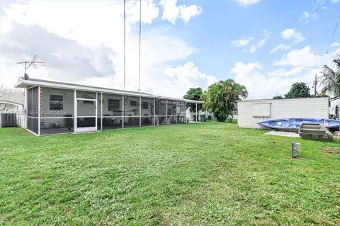 Exterior - 355 W 54th St, Hialeah, FL 33012 photo 11 of 12