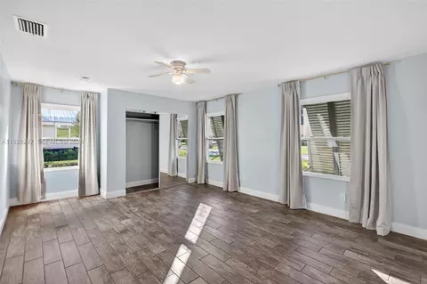 Bedroom - 3804 SE Fairway E, Stuart, FL 34997 photo 2 of 8
