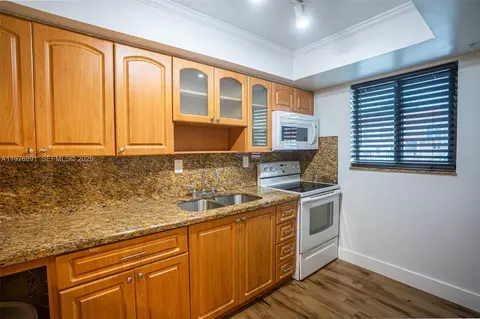 Kitchen - 895 W 80th Pl, Hialeah, FL 33014 photo 2 of 3