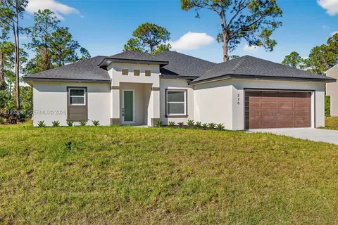 220 Lomax Ave, Lehigh Acres, FL 33974