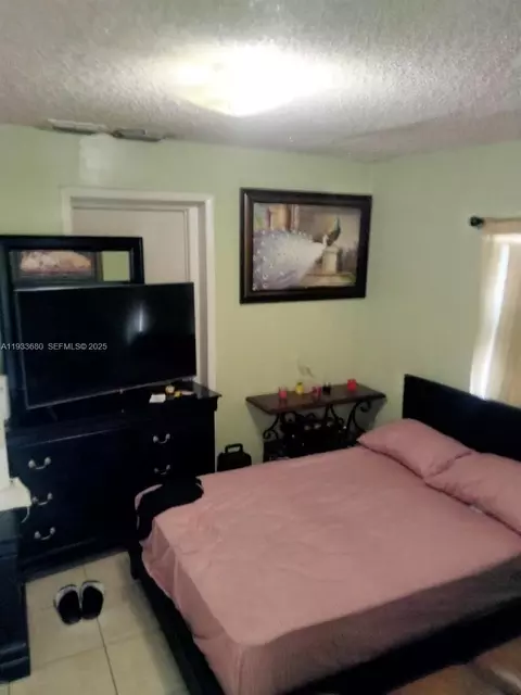 Bedroom - 4990 E 1st Ave, Hialeah, FL 33013 photo 3 of 3