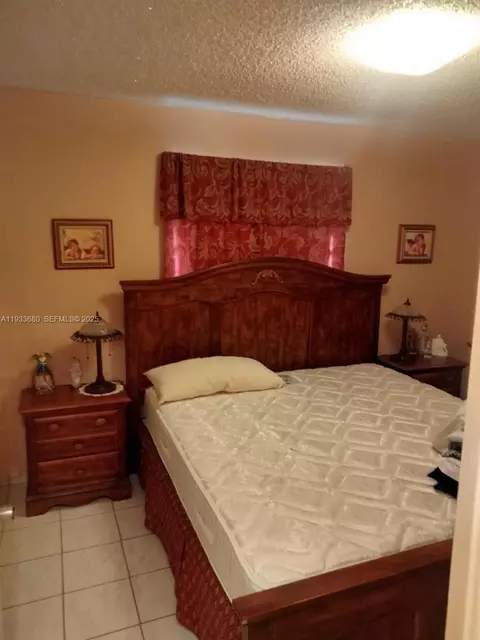 Bedroom - 4990 E 1st Ave, Hialeah, FL 33013 photo 1 of 3