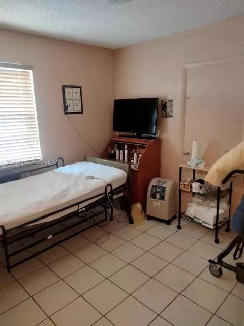 Bedroom - 4990 E 1st Ave, Hialeah, FL 33013 photo 2 of 3