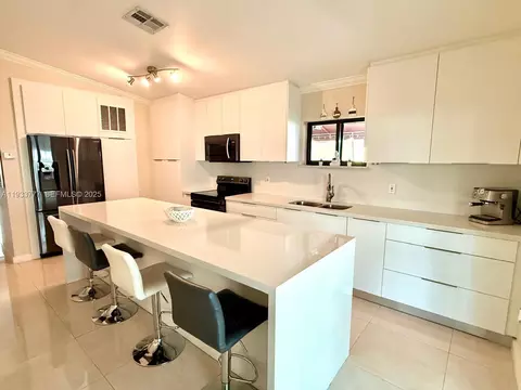 Kitchen - 7185 W 30th Ln, Hialeah, FL 33018 photo 1 of 1
