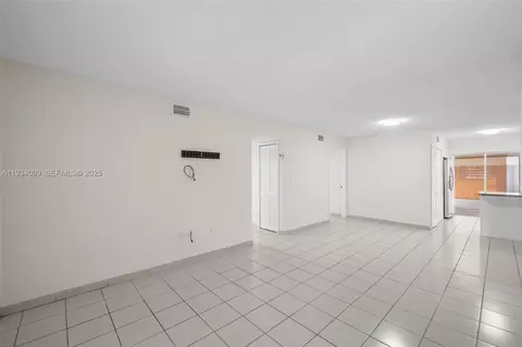 Living - 2425 W 76th St #102, Hialeah, FL 33016 photo 3 of 5