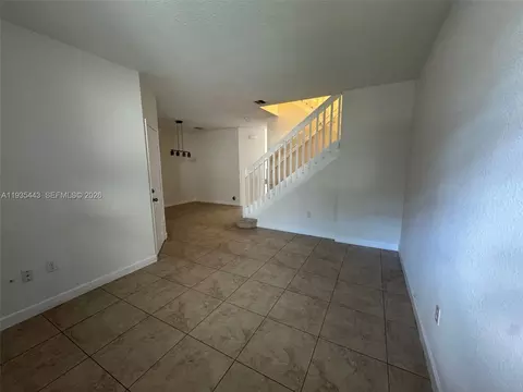 Living - 1027 NE 207th St #1027, Miami, FL 33179 photo 1 of 5