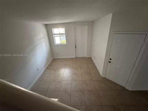 Living - 1027 NE 207th St #1027, Miami, FL 33179 photo 3 of 5