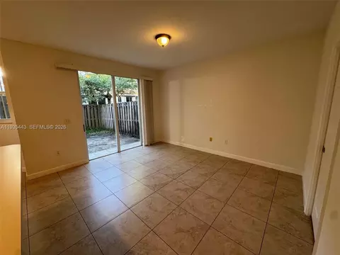 Living - 1027 NE 207th St #1027, Miami, FL 33179 photo 2 of 5