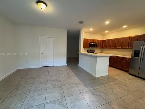 Living - 1027 NE 207th St #1027, Miami, FL 33179 photo 5 of 5