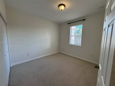 Bedroom - 1027 NE 207th St #1027, Miami, FL 33179 photo 2 of 5