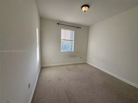 Bedroom - 1027 NE 207th St #1027, Miami, FL 33179 photo 4 of 5