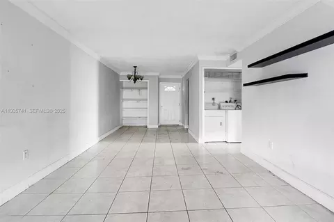 Living - 6195 W 18th Ave #G125, Hialeah, FL 33012 photo 2 of 3