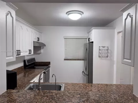 7703 Camino Real #A-307, Miami, FL 33143